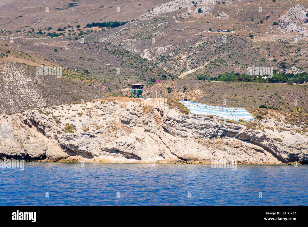 Un greco di vedetta militare post lungo la costa di Kos, Dodecanneso, Grecia Foto Stock