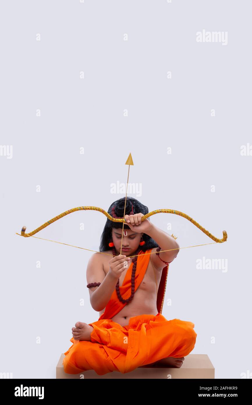 Ram signore seduto con arco e frecce Foto Stock