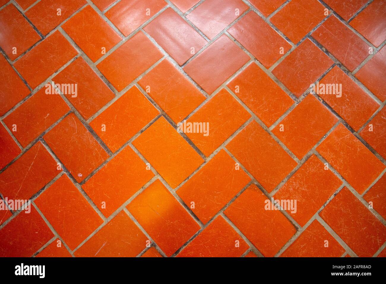 Piastrelle di colore arancione in un edificio su Ellis Island Foto Stock