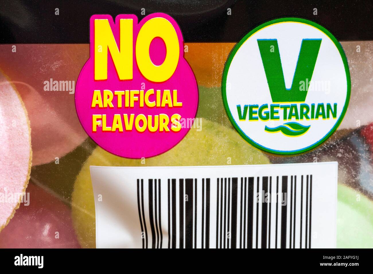 Senza aromi artificiali & V simboli vegetariana del logo sul pacchetto di borsa paraurti battenti piattini sorbetto riempito i dischi di wafer Foto Stock