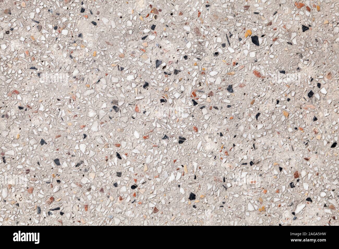 Vintage pavimenti in pietra con pattern di ghiaia nel basamento in cemento Foto Stock