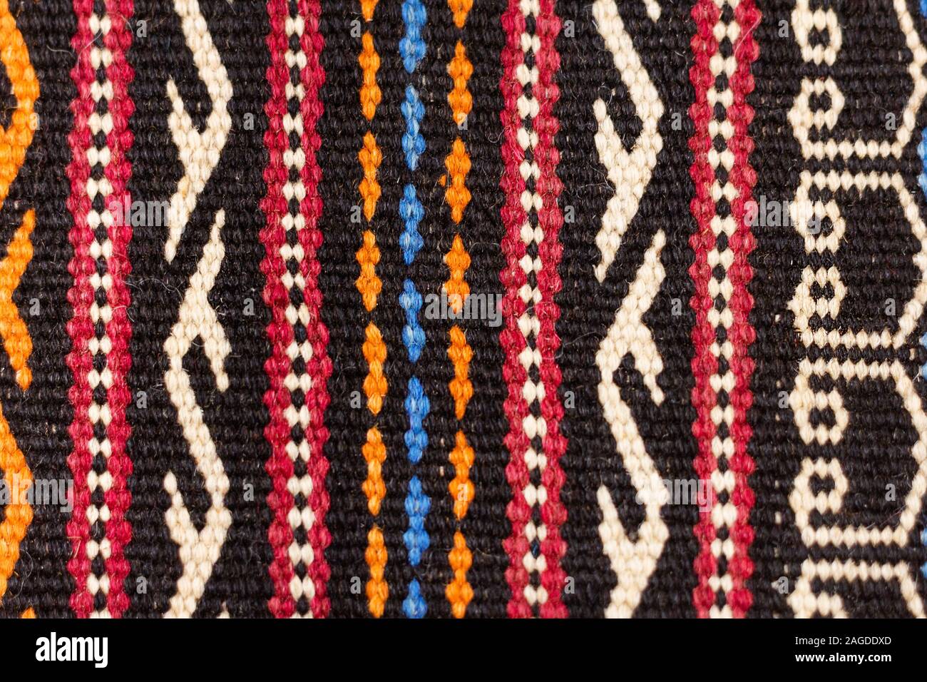 Aztec pattern ricamato cuciture colore simmetria coperta Foto Stock