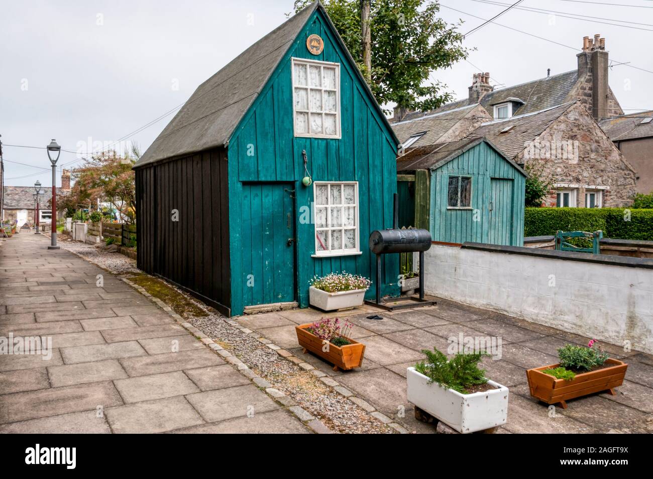 Footdee o Fittie è una vecchia comunità di pesca a est di Aberdeen Harbour, ora parte della città e una zona di conservazione. Foto Stock