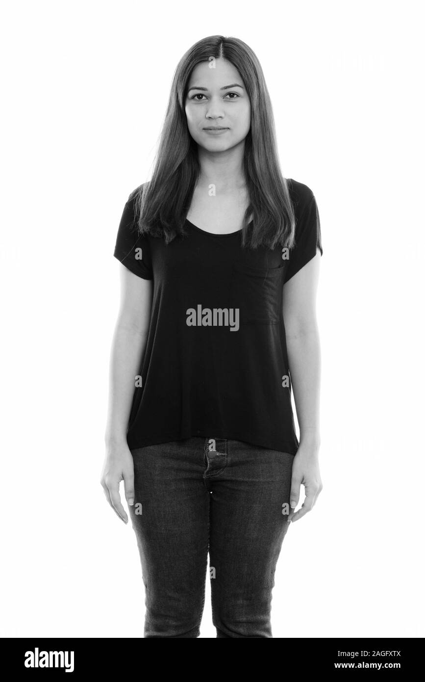 Studio shot del giovane bella donna in piedi Foto Stock