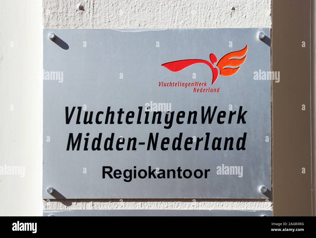 Segno a Vluchtelingenwerk Midden-Nederland office (Consiglio olandese per i rifugiati medio bassi). Il Consiglio difende gli interessi dei richiedenti asilo. Foto Stock