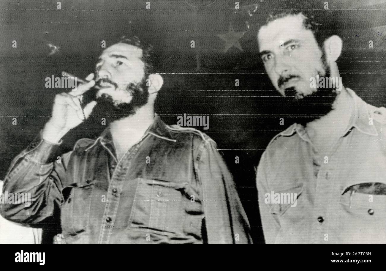 Premier cubano Fidel Castro di fumare un sigaro, Havana, Cuba degli anni sessanta Foto Stock