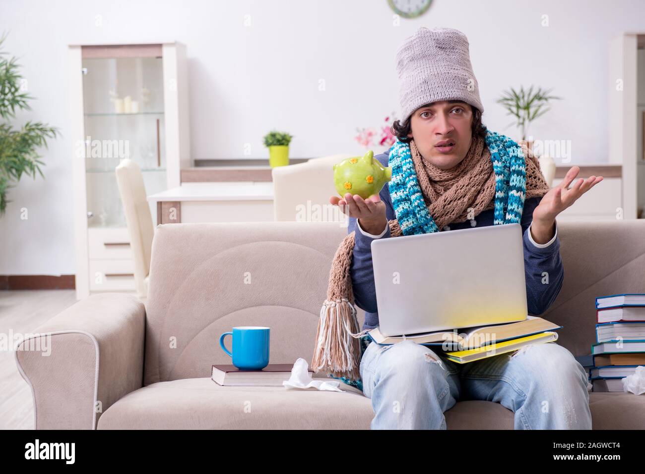 I malati di sesso maschile di sofferenza dello studente a casa Foto Stock