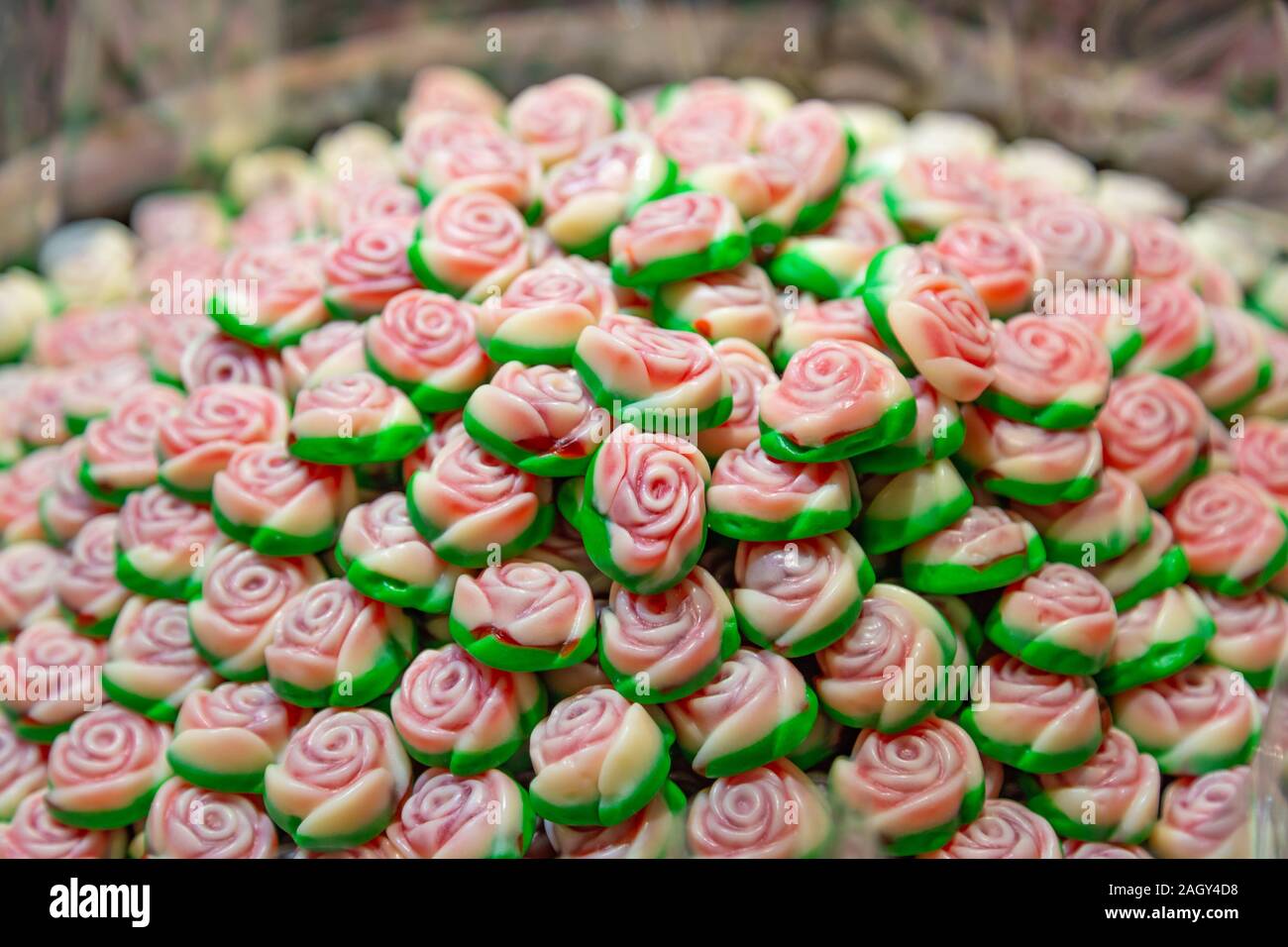 Sfondo con rose jelly caramella di frutta Foto Stock