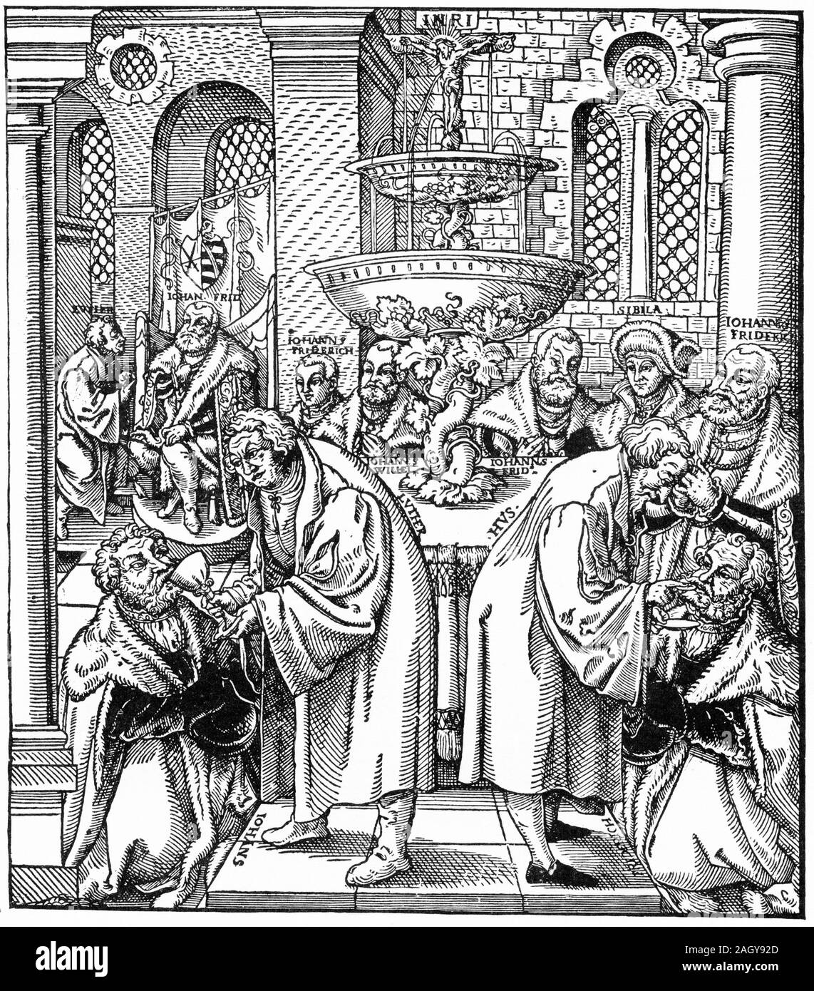 Xilografia da Lucas Cranach il Vecchio raffigurante Luther (sinistra) e Jan Hus che serve sia il pane e il vino in comunione per la casa di Sassonia. Foto Stock