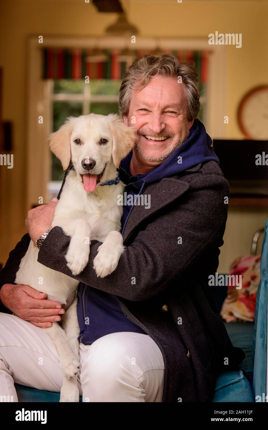 TV personality Tommy Boyd al suo West Sussex home. Foto Stock