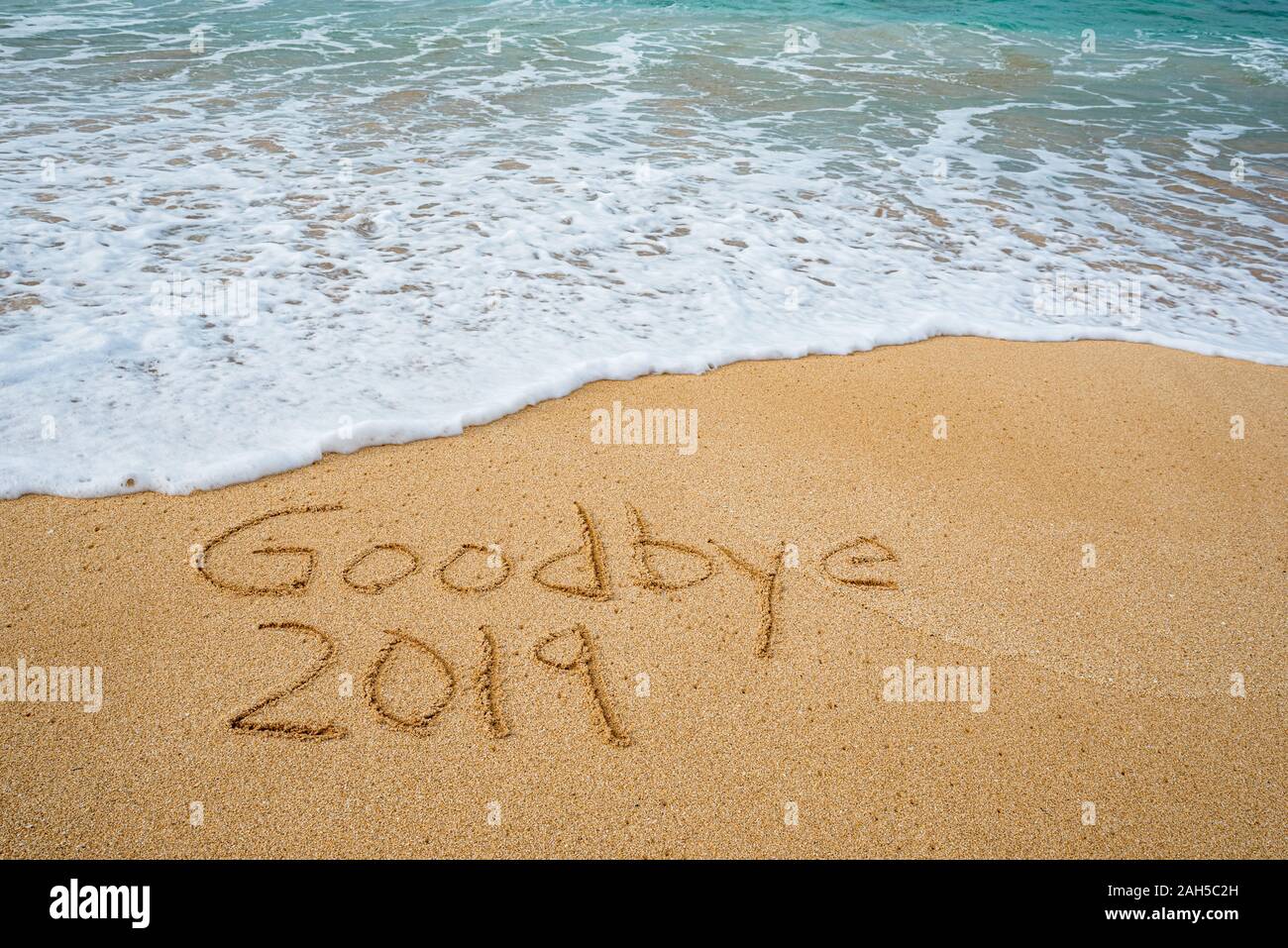 Addio 2019 scritto nella sabbia- Anno Nuovo concetto Foto Stock