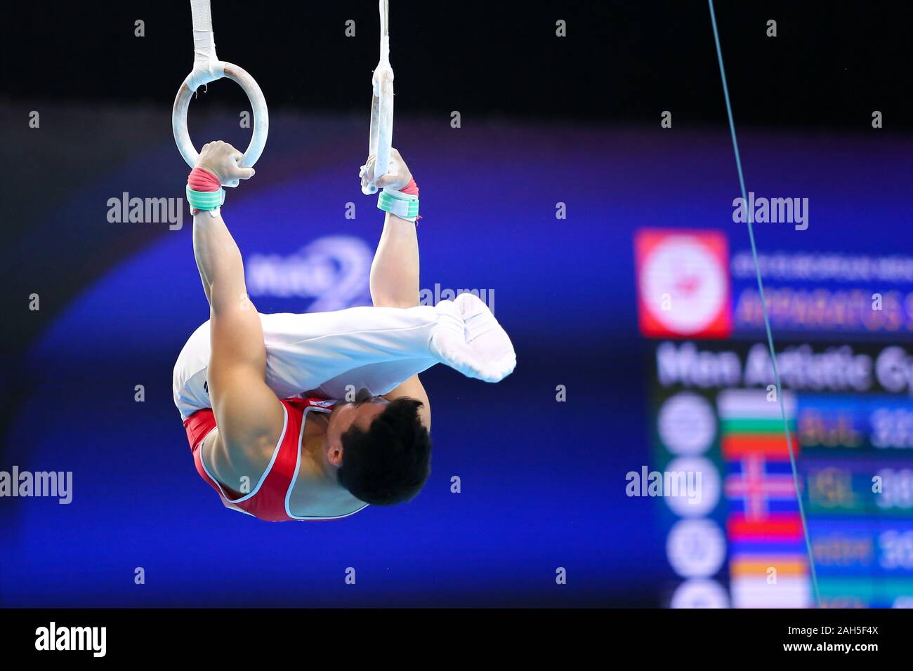 Szczecin, Polonia, 10 Aprile 2019: Yusof Eddy della Svizzera compete sugli anelli durante la ginnastica artistica campionati Foto Stock Szczecin, Polonia, 10 Aprile 2019: Yusof Eddy della Svizzera compete sugli anelli durante la ginnastica artistica campionati Foto Stock