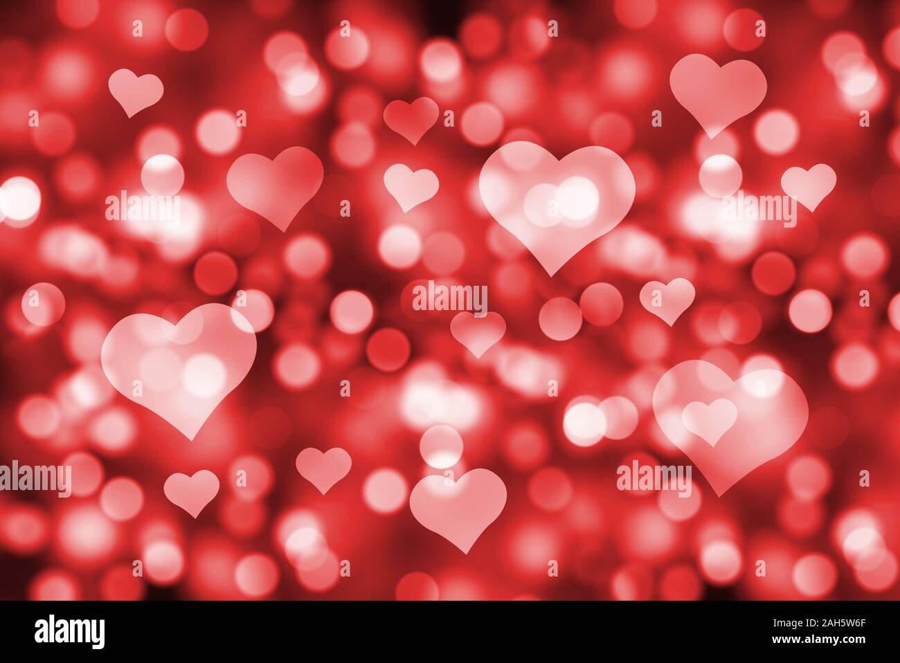 Cuori bokeh di fondo per effetto dello sfondo. Abstract sfondo con cuori forme. Il giorno di San Valentino, Festa della mamma, compleanno biglietti di auguri, invito celebrazione Foto Stock