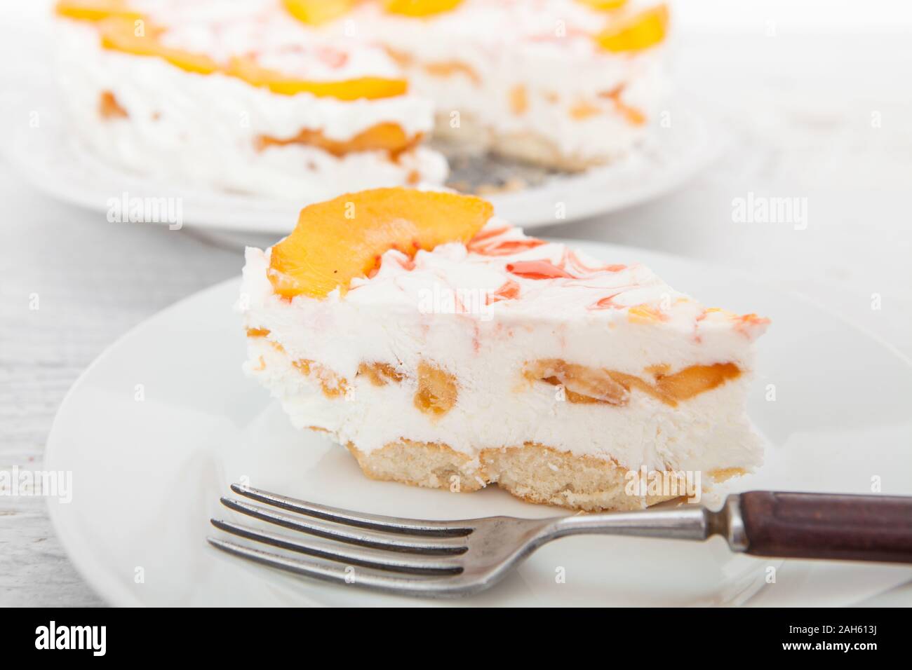 Pesca e yogurt torta Foto Stock