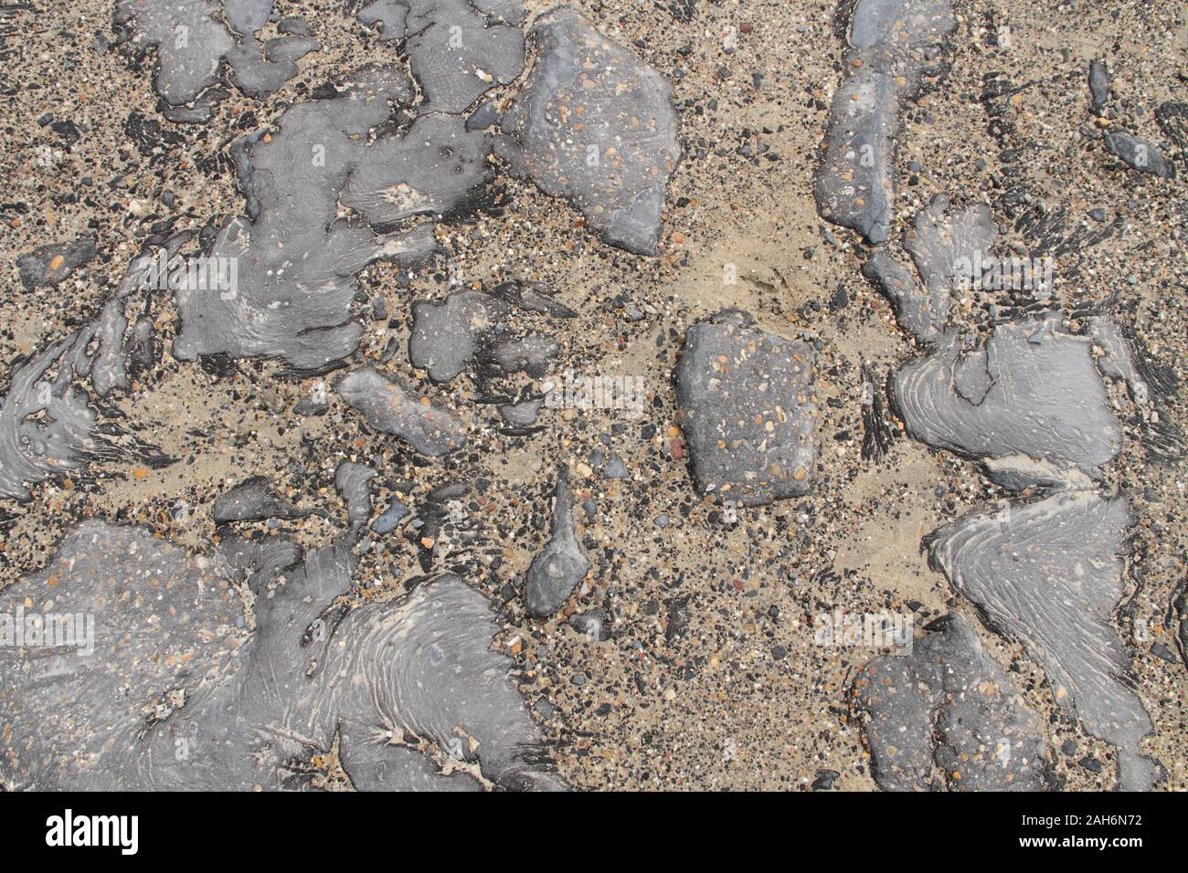 Inquinamento con catrame sulla spiaggia Foto Stock