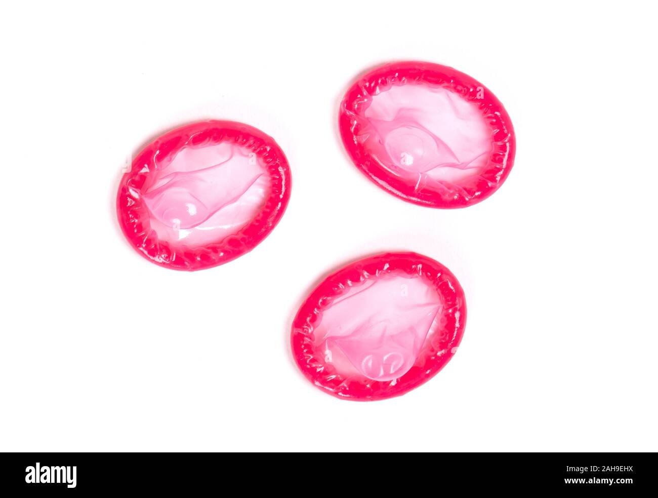 Red preservativo, isolato su uno sfondo bianco Foto Stock