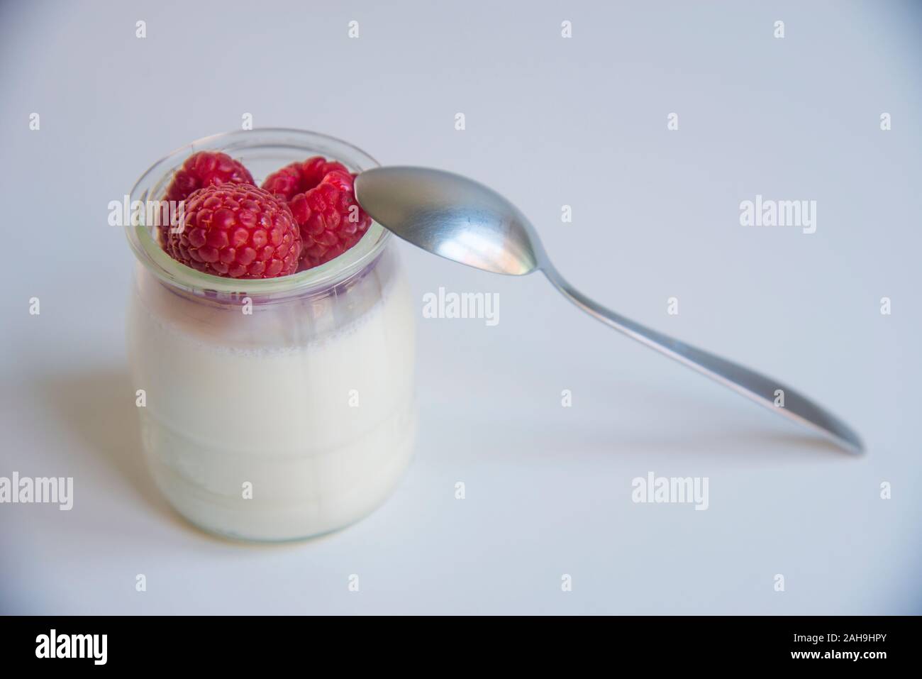 Yogurt con lamponi. Foto Stock