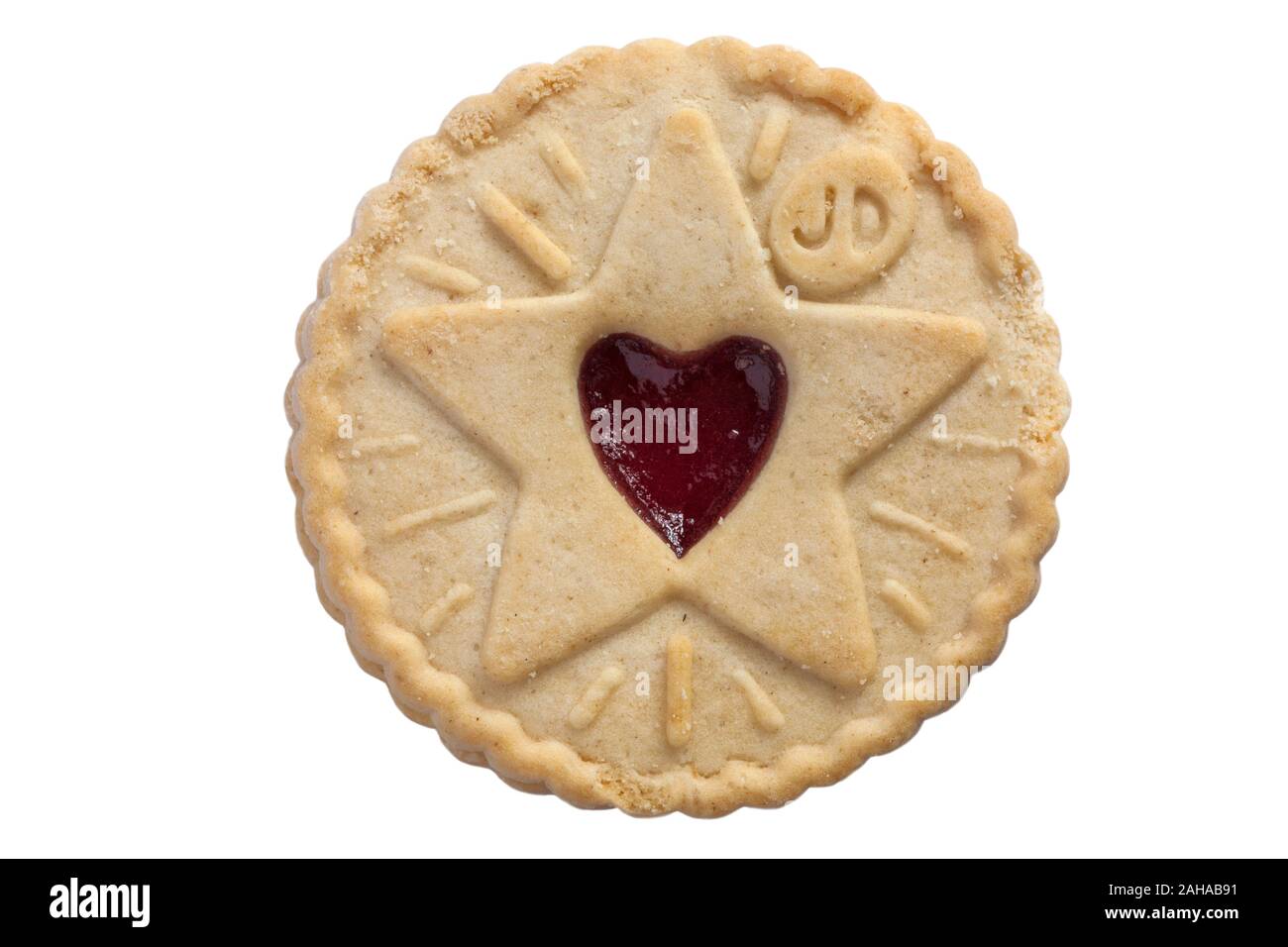 Jammie Dodger aroma di lampone biscuit tis la stagione per essere jammie con design a stella isolato su sfondo bianco Foto Stock