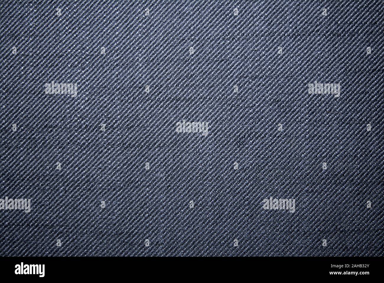 Qui è un blu denim come tessuto che varia in bianco e filo blu Foto Stock