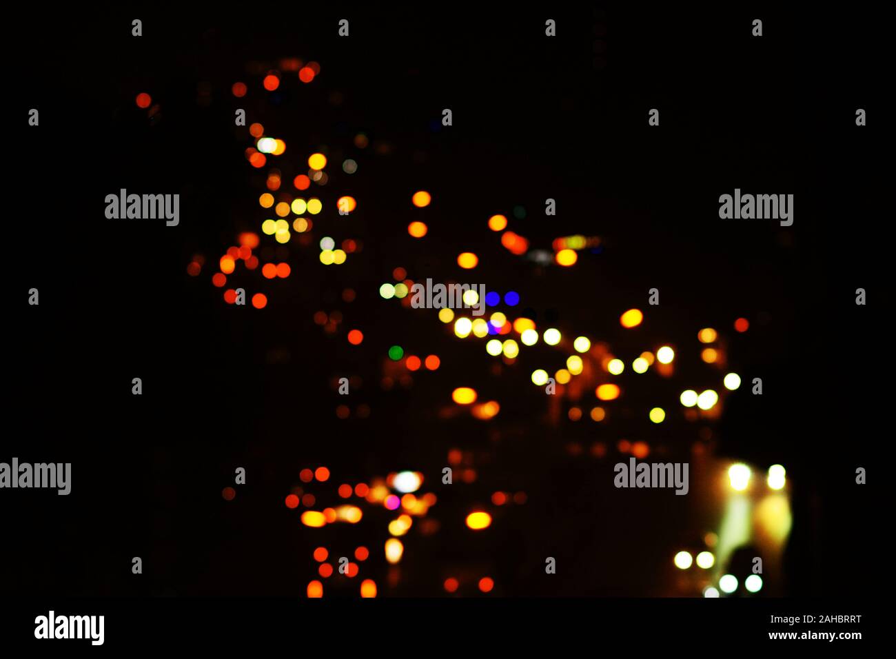 Notte di Luce bokeh città blur. Foto Stock