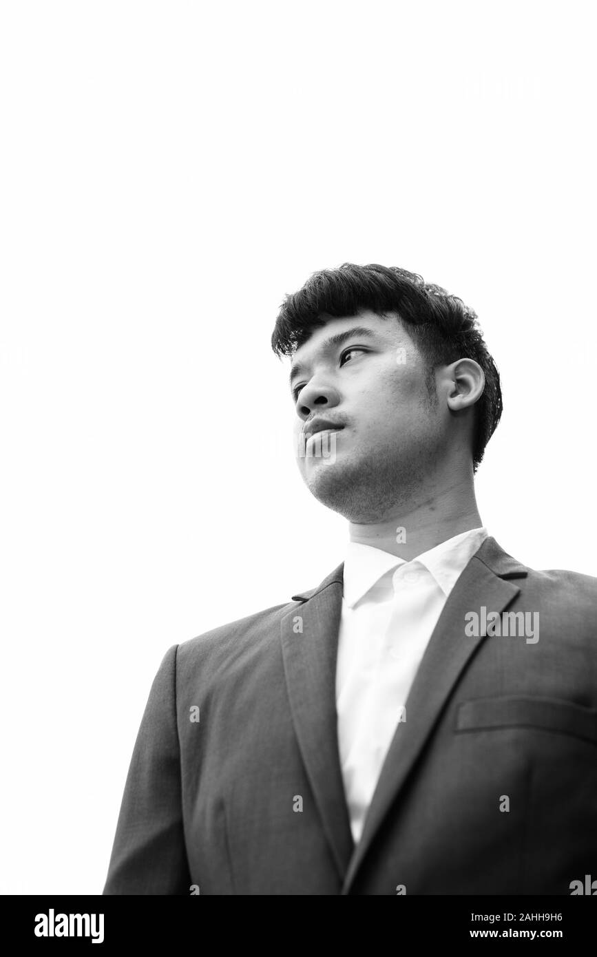 Giovane imprenditore asiatici contro la vista della città di Bangkok, Thailandia Foto Stock