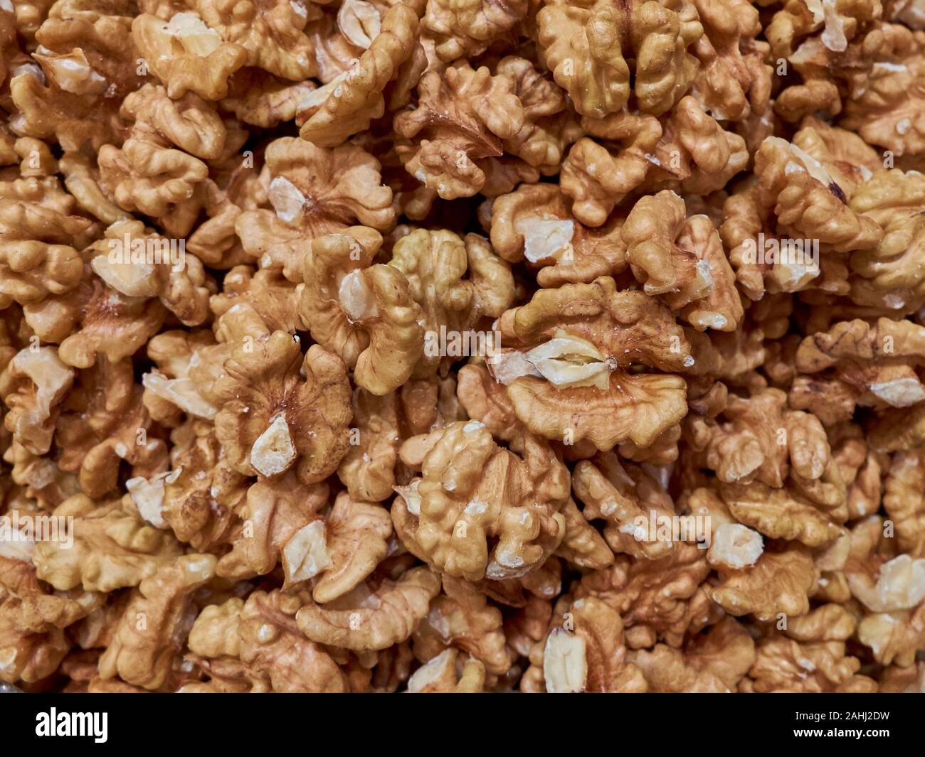 Materie di gherigli di noce texture di sfondo o il concetto. Foto Stock