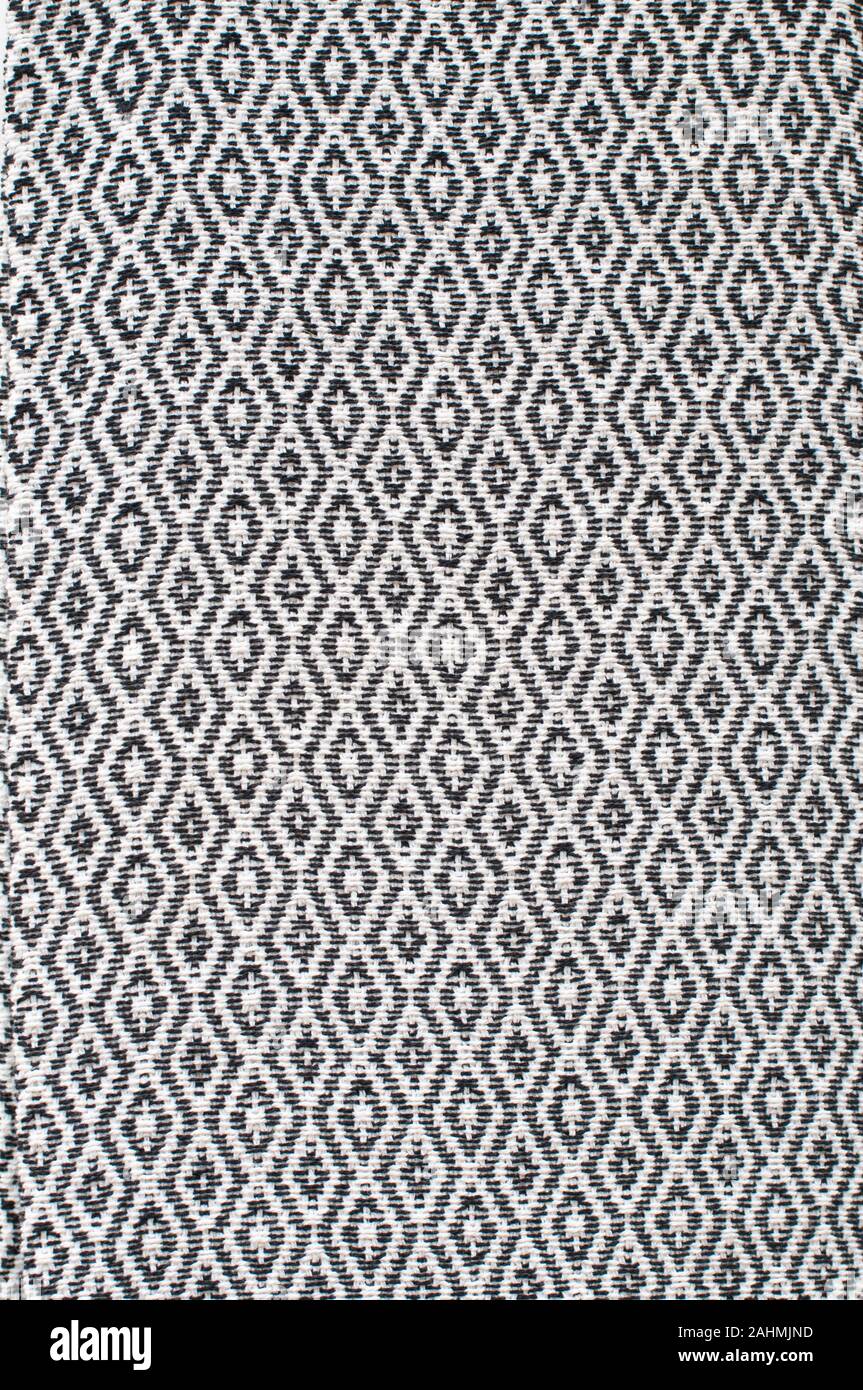 Primo piano della maglia in tessuto tessile con sfondo anche distanziati fili di ordito e fili di trama Foto Stock