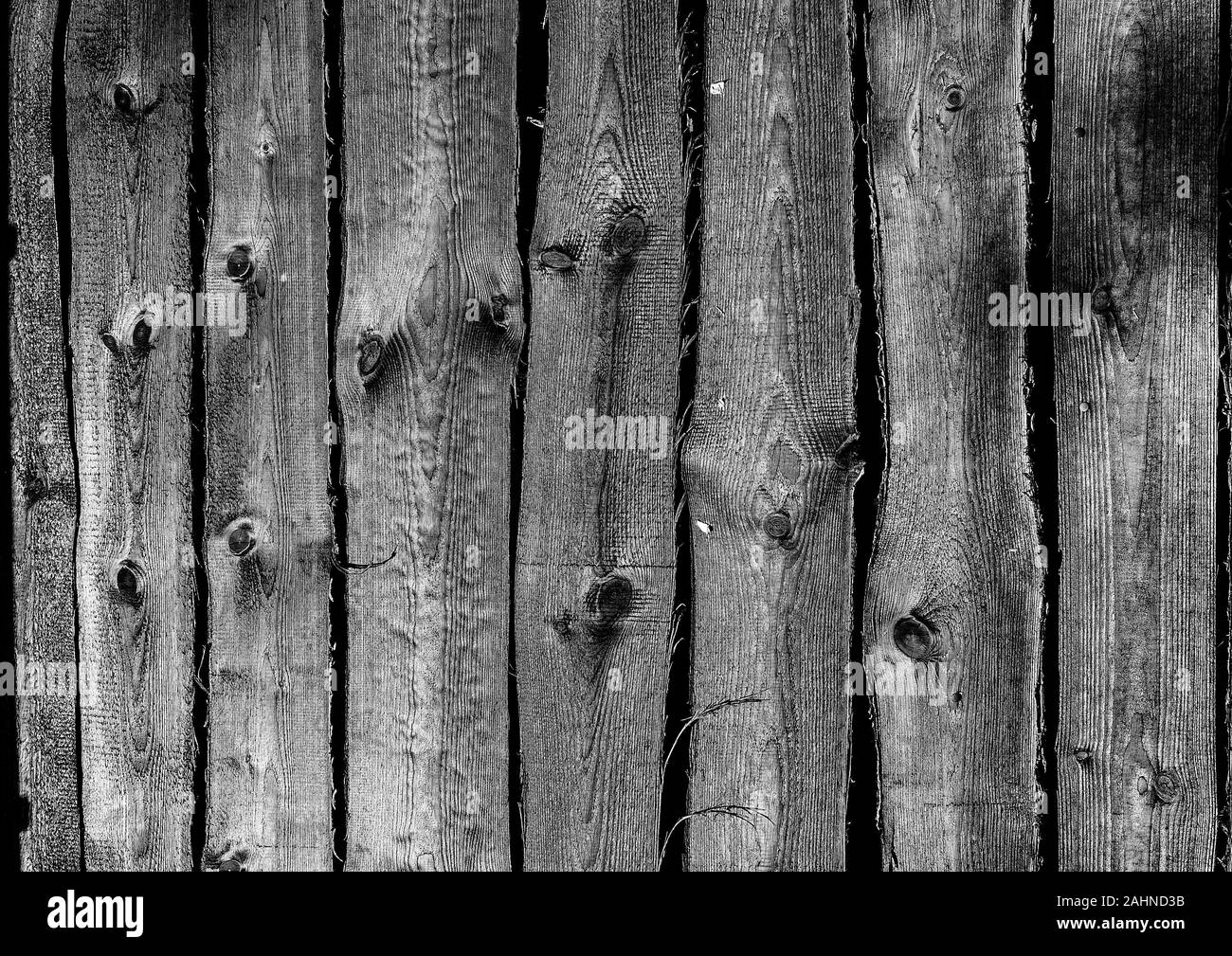 Immagine in bianco e nero di vecchi rustici recinzione tavoloni sfondo testurizzata Foto Stock