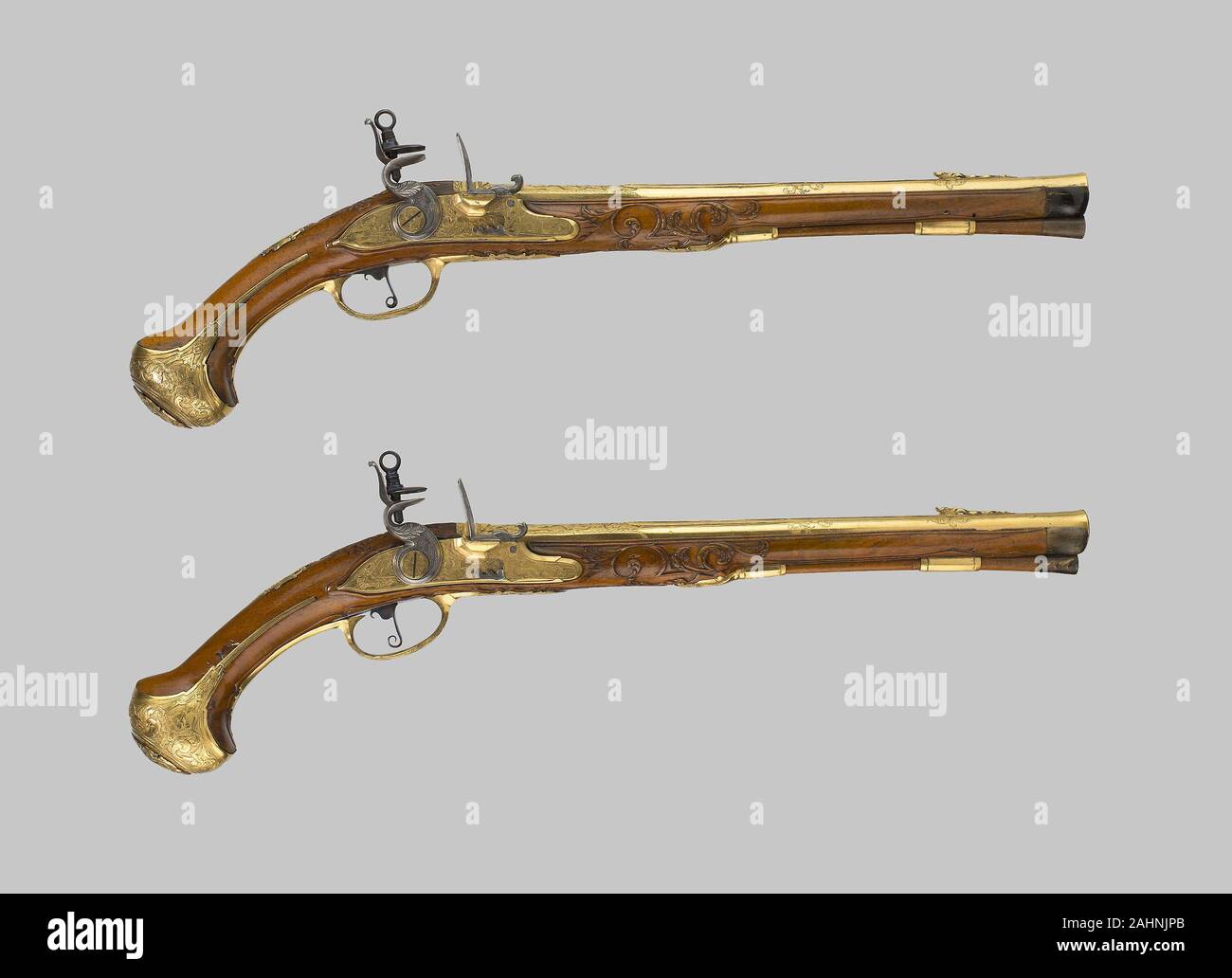 Coppia di custodia Flintlock Pistols. 1700-1725. Vienna. acciaio, ottone, doratura, noce, e avvisatore acustico Foto Stock