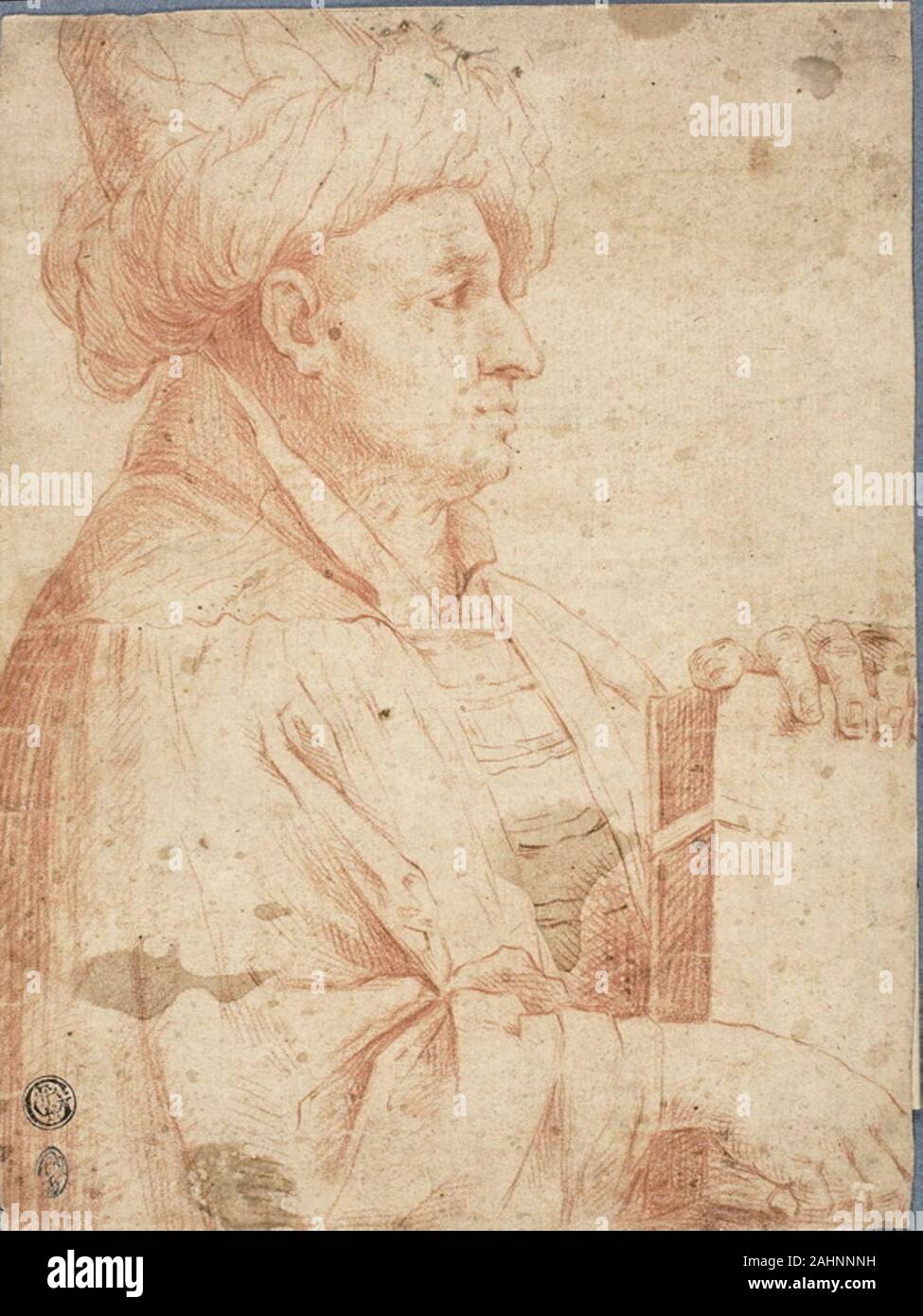 Il Guercino. Busto di Turbanned uomo con un libro. 1611-1799. L'Italia. Gesso rosso sulla crema di latte di cui la carta Foto Stock