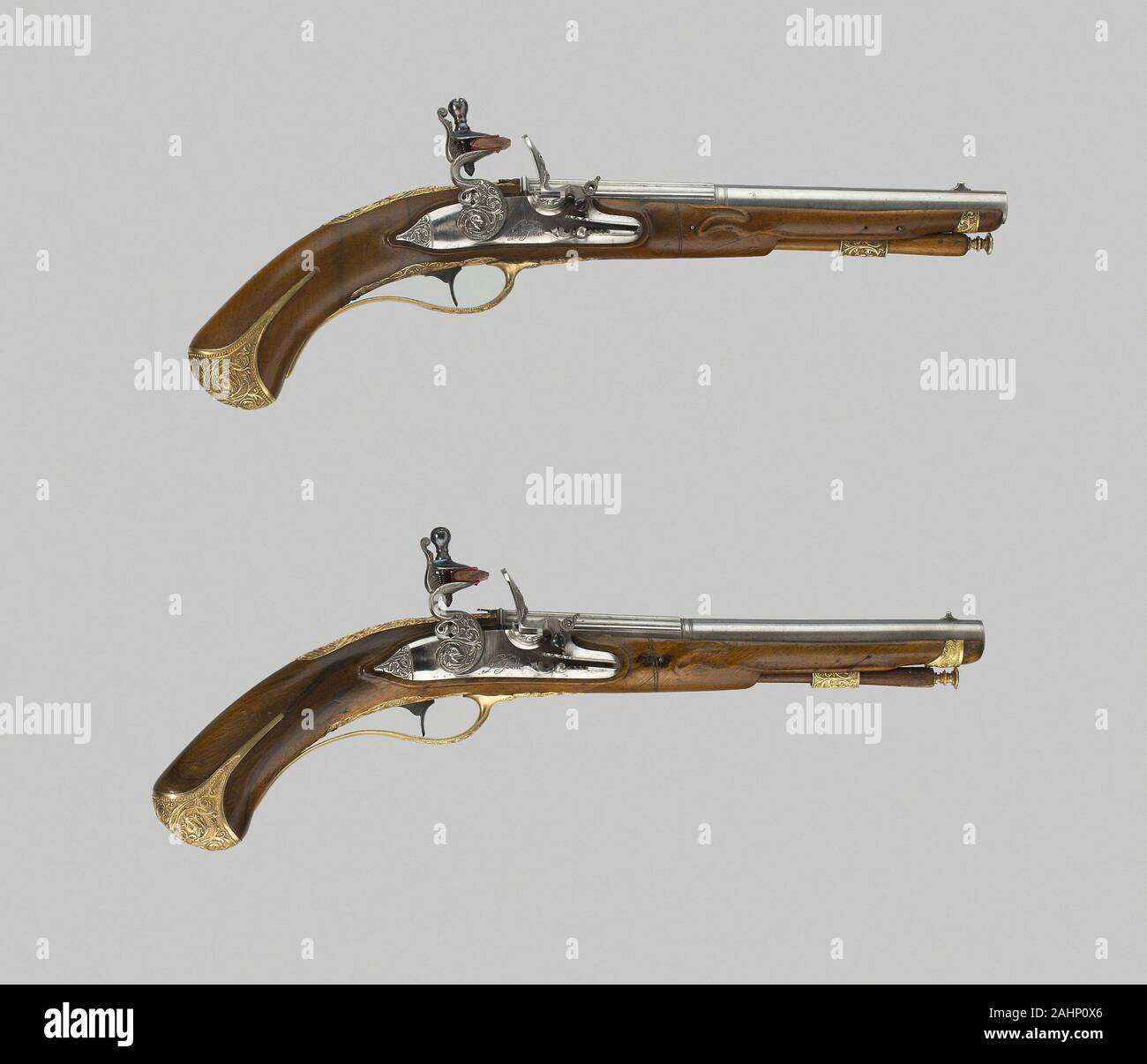 Lazzarino Cominazzo. Coppia di Flintlock Pistols. 1700-1740. Brescia. Noce e ottone dorato Foto Stock