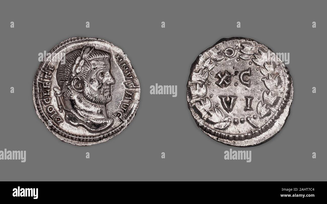 Antico romano. Argenteus (moneta) raffigurante l'imperatore Diocleziano. 300 annuncio. Impero Romano. Argento testa complementare di Diocleziano a destra, laureateReverse corona di alloro Foto Stock