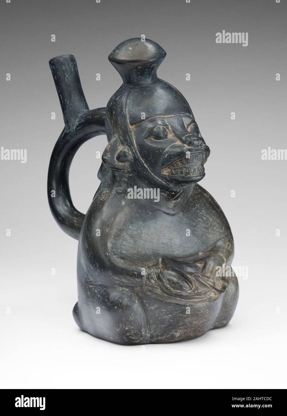 Moche. Vaso in forma di un batterista mascherato. 100 BC-500 D.C. Santa Valle. Ceramica Foto Stock