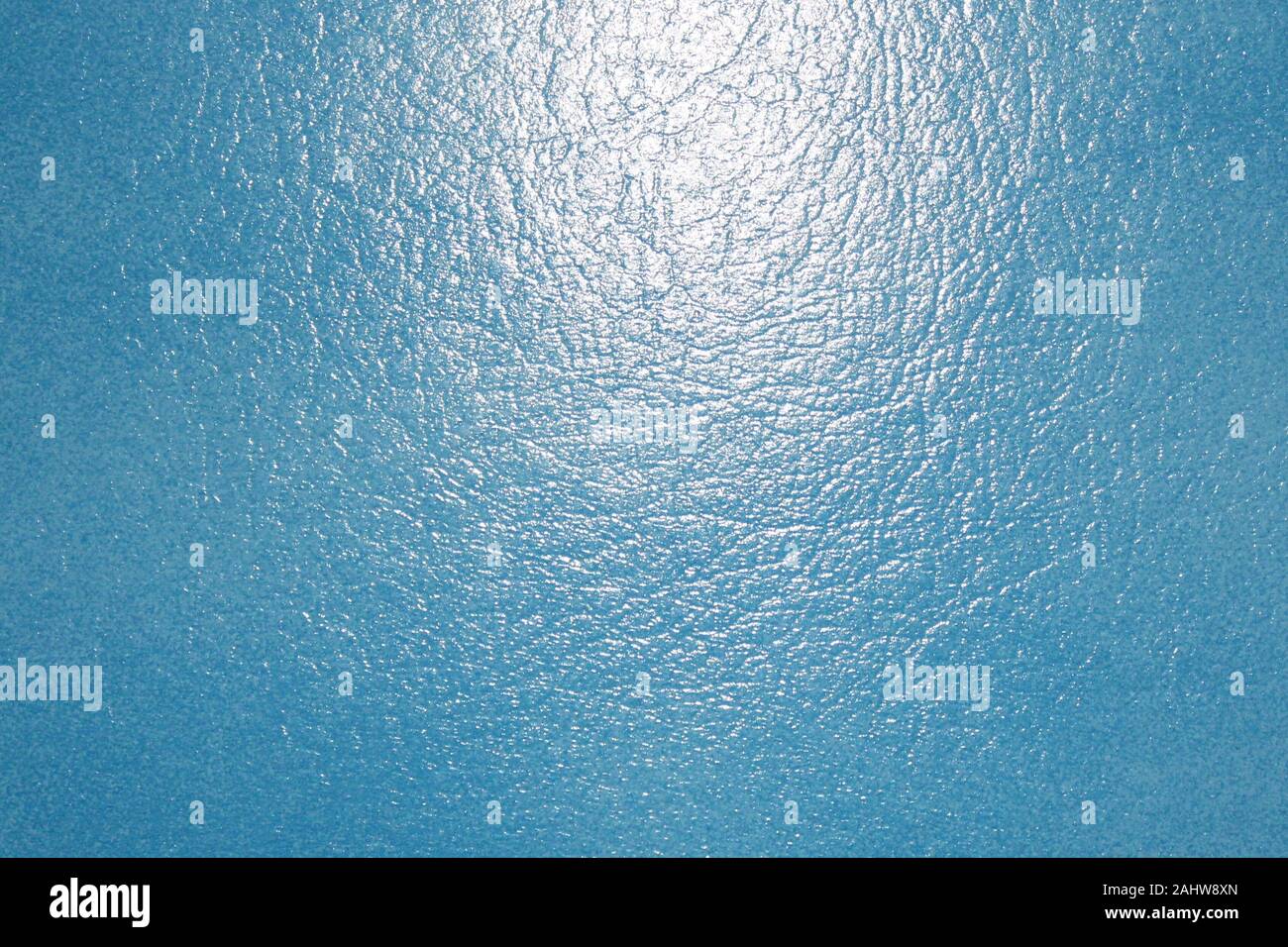 La figura mostra uno sfondo blu con pelle strutturato con la luce Foto Stock