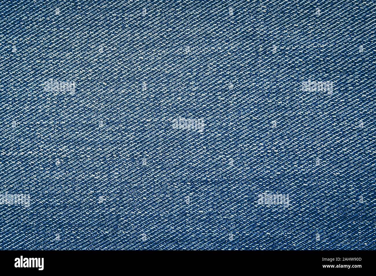 Texture jeans denim tessuto fotografato vicino fino per lo sfondo Foto Stock