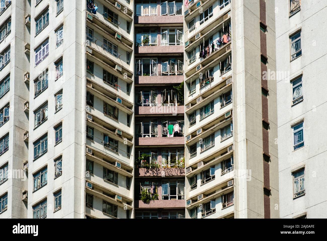 Facciata di edificio, alto luogo di immobili residenziali, HongKong Foto Stock