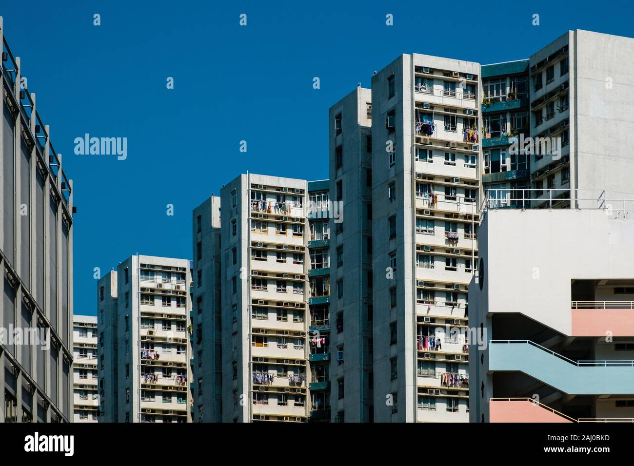 Facciata di edificio, alto luogo di immobili residenziali, HongKong Foto Stock