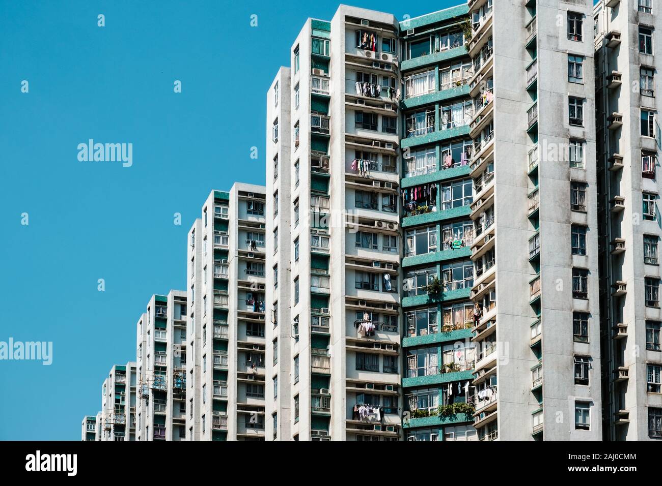 Facciata di edificio, alto luogo di immobili residenziali, HongKong Foto Stock