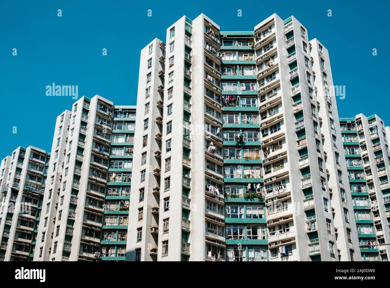 Facciata di edificio, alto luogo di immobili residenziali, HongKong Foto Stock