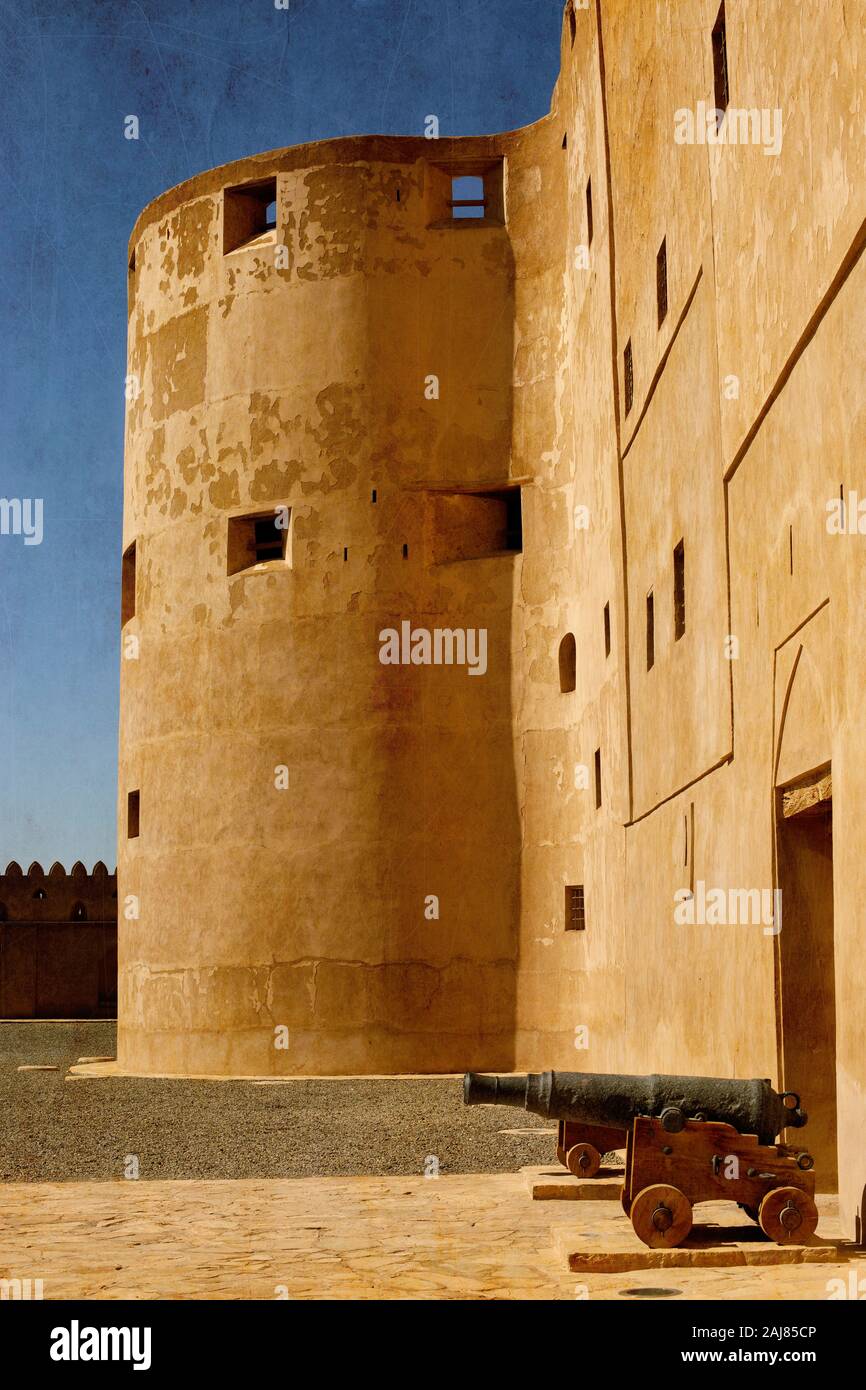 Il Forte Jabrin con cannoni in Oman Foto Stock