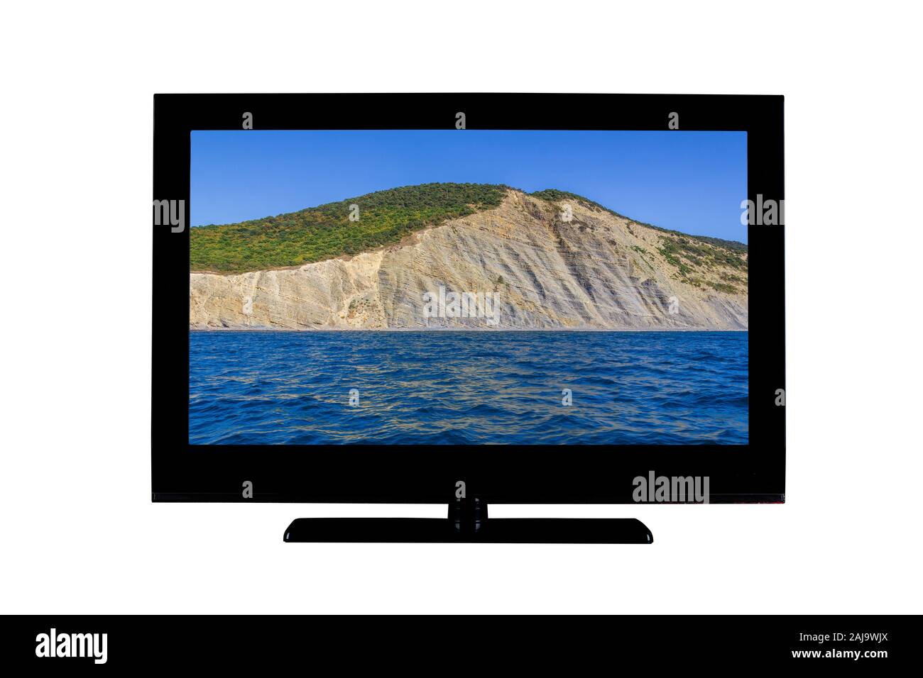 Monitor full hd o TV con un'isola nel mare sullo schermo isolato su sfondo bianco Foto Stock