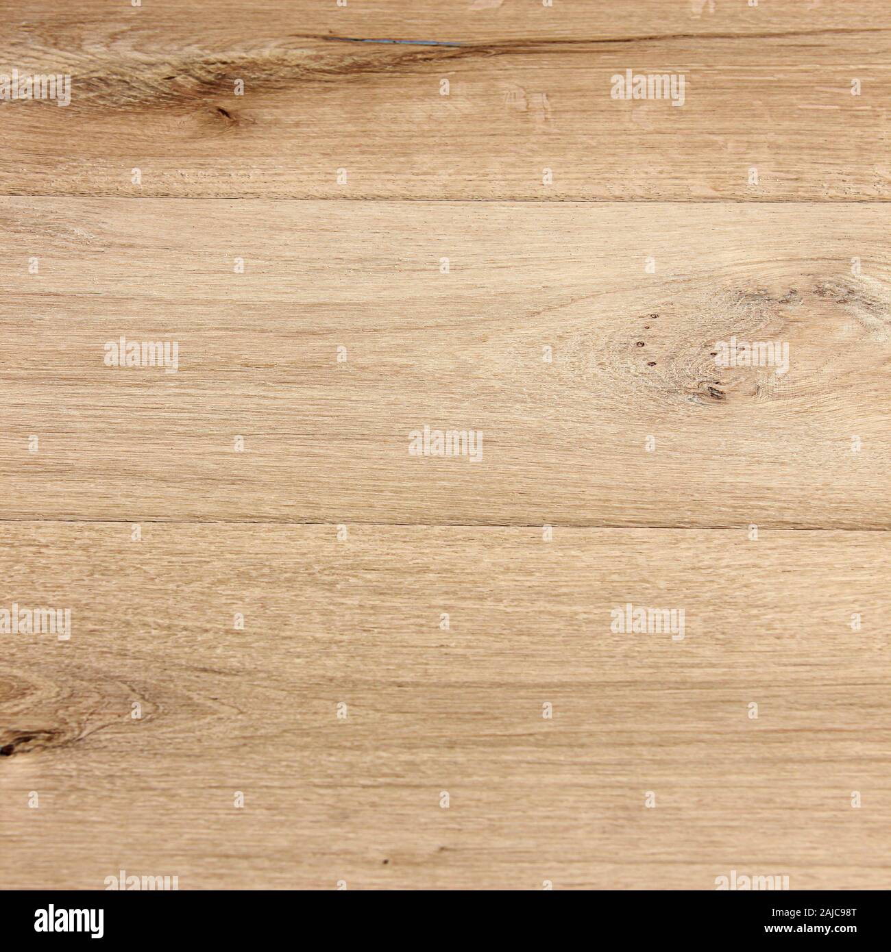 Pavimento in legno di sfondo texture in 12x12 per il graphic design risorsa. Doghe in legno sono di colore chiaro e di eseguire linee orizzontali in la venatura del legno. Foto Stock
