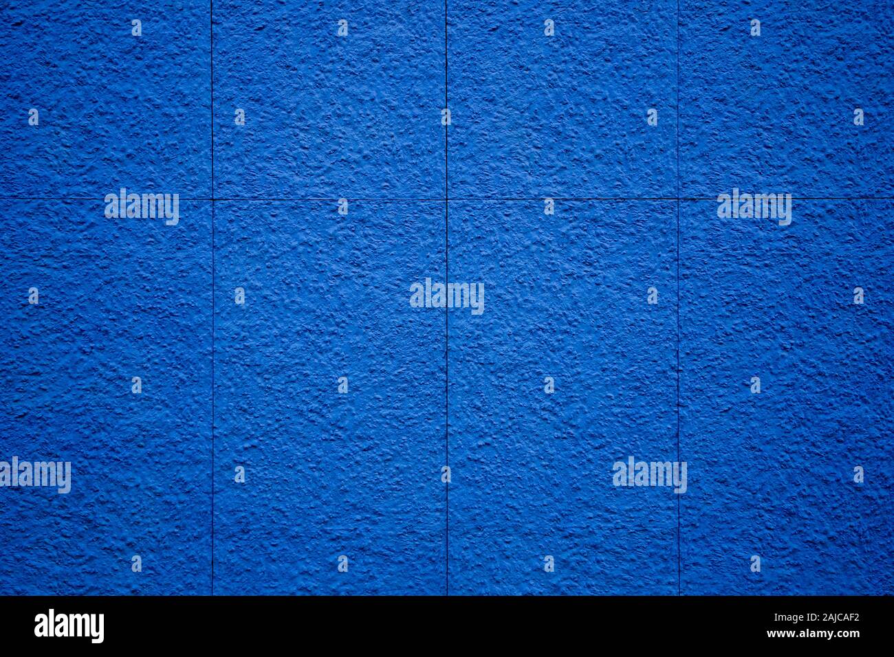 Superficie ruvida parete blu composto da lastre di pietra Foto Stock