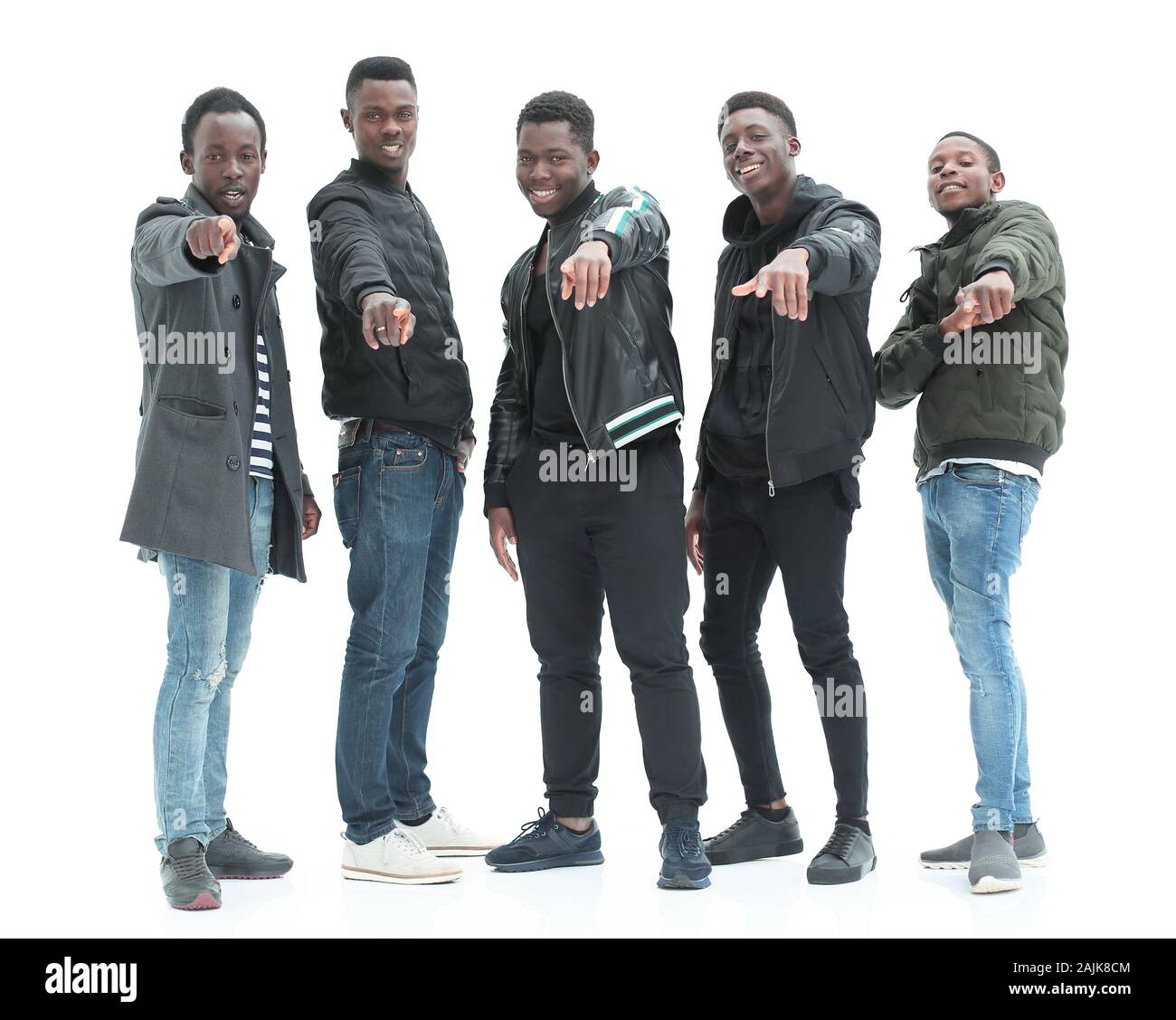 Fiducioso ragazzi moderni rivolti a voi . isolato su bianco Foto Stock