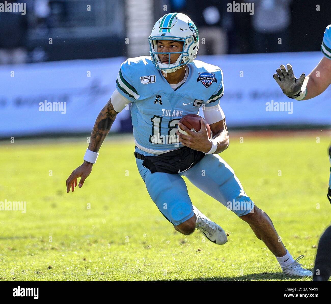 4 gennaio 2020: Tulane di Justin McMilan #12 corre con la palla durante la Lockheed Martin Forze Armate ciotola partita di calcio tra la Southern Miss aquile reali e la Tulane Onda Verde a Amon G. Carter Stadium di Fort Worth, Tx. Kyle Okita/CSM Foto Stock