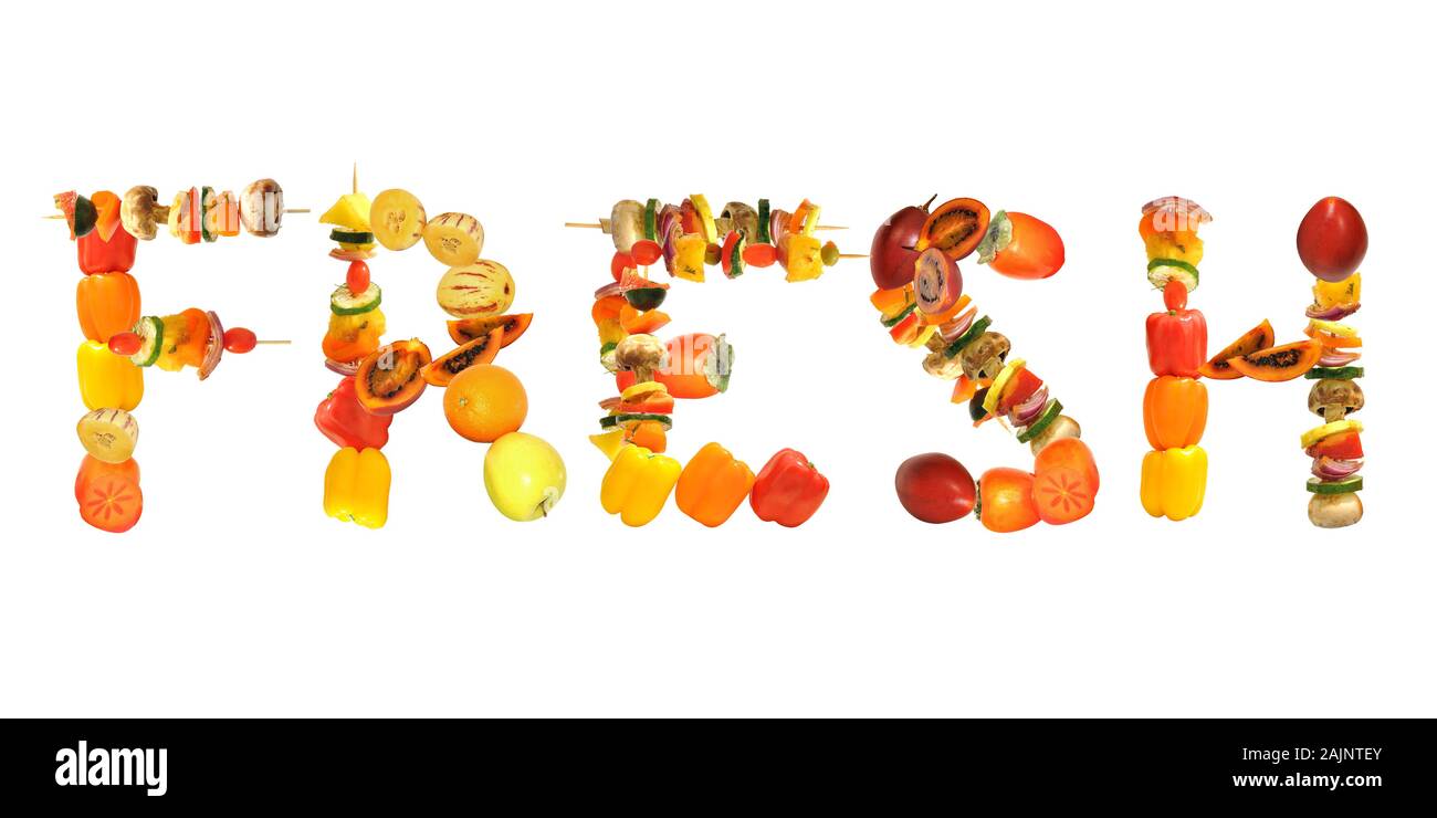 Whole foods costituita da frutta e verdura disposti a scrivere la parola freschi Foto Stock