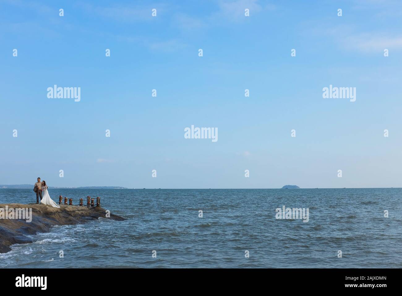 Un paio di prendere parte a un matrimonio scatta in Xiamen (Amoy), Cina. Foto Stock