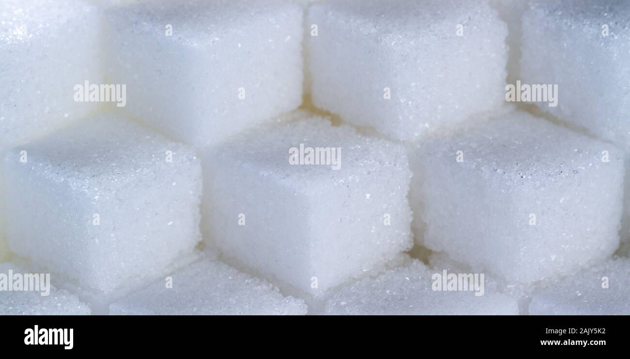 macro di un motivo cubico fatto di cubetti di zucchero Foto Stock