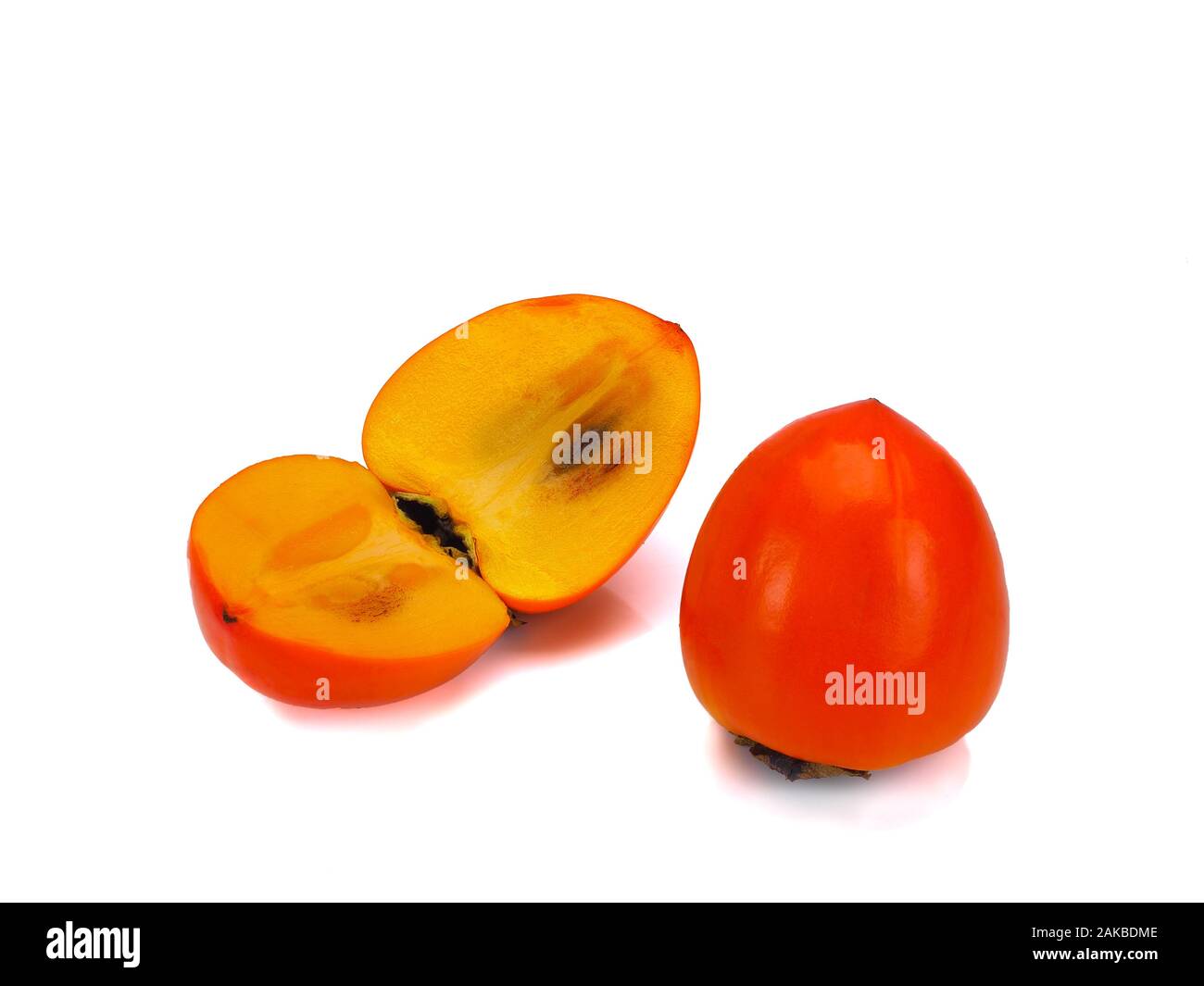 Fresche e mature persimmon isolati su sfondo bianco Foto Stock