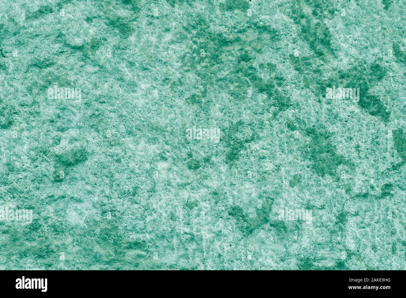 Verde smeraldo dipinti a muro in stucco. Texture di sfondo Foto Stock